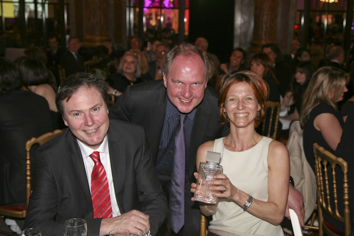 From left, Symrise CEO Heinz-Jürgen Bertram; Achim Daub, global president of scent and care at Symrise; and Emilie Coppermann, recipient of the Prix Lalique