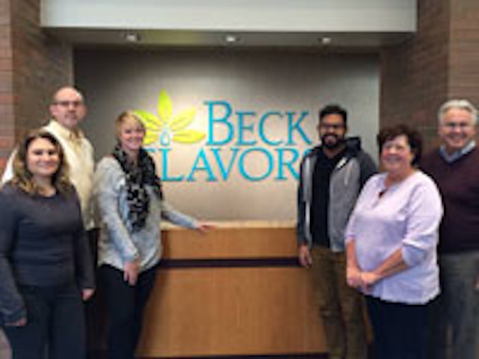 Cincinnati-area staff in the company's new lobby (from left): Maria Gottmann, Joe Willoughby, Kate Sloane, Rahul Mathur, Sally Boettjer, and Bob Sloane.