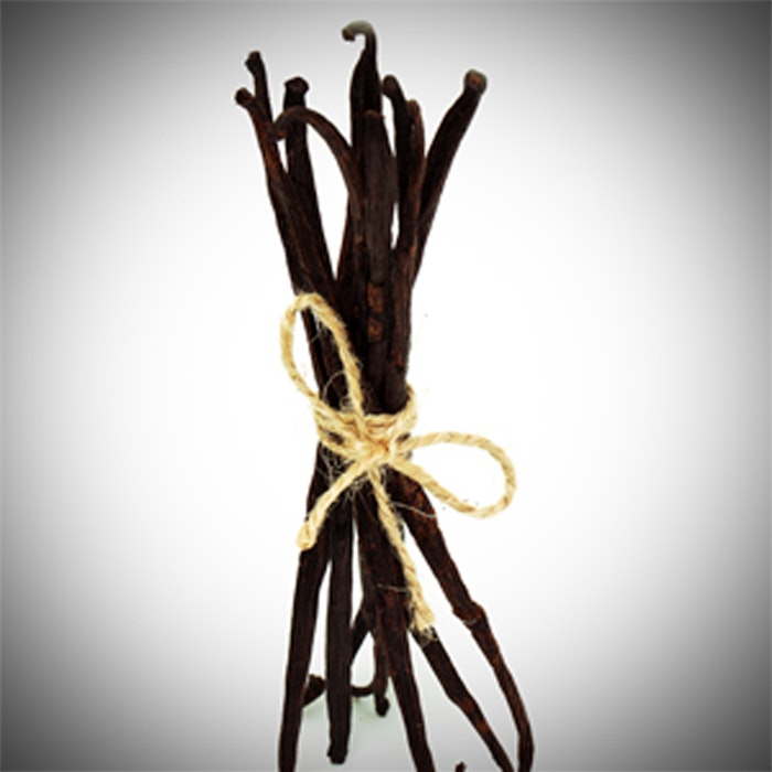 vanilla beans and orchid flower