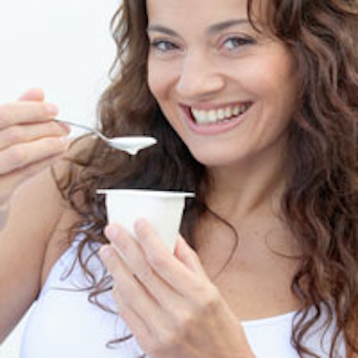 Woman-eating-yogurt-200