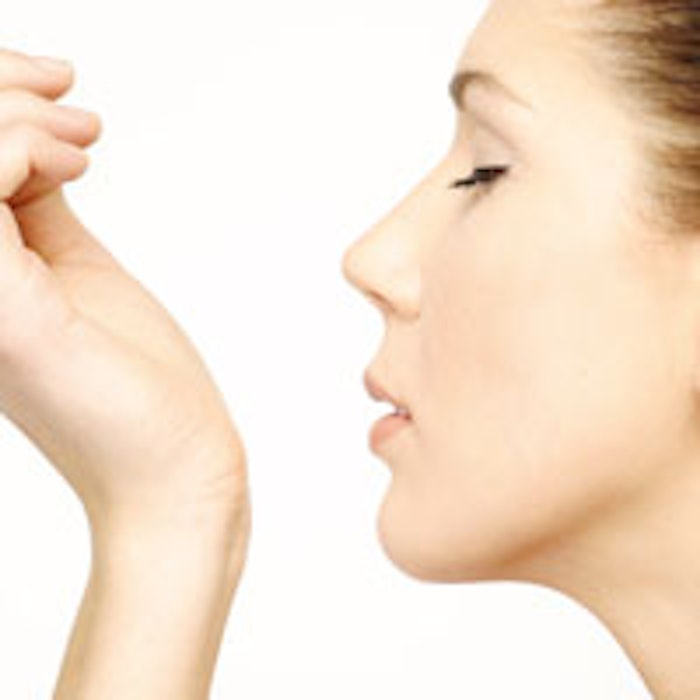 Woman-sniffing-wrist-200