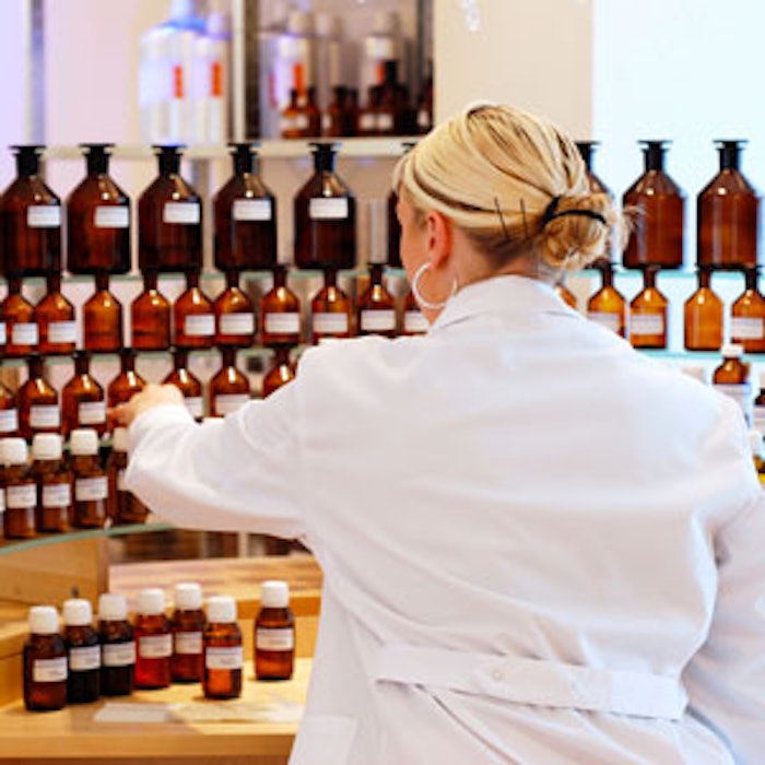 Perfumer-with-bottles-300