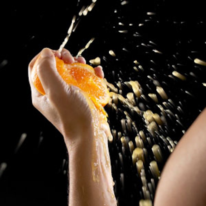 Squeezing-orange-splatter-300