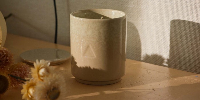 The collection features 13 scented candles