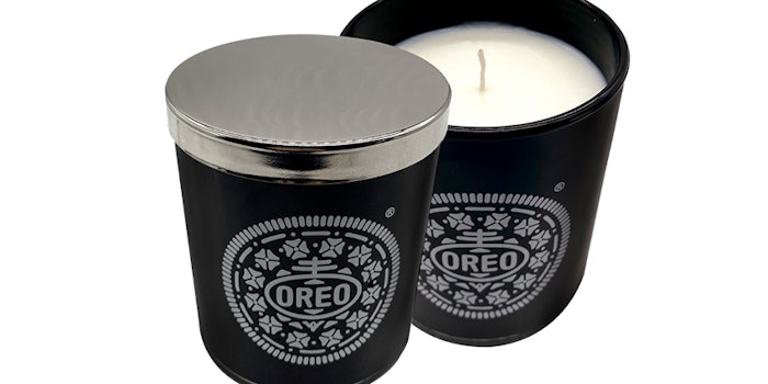The black and white candle is said to smell like and Oreo factory. Photo: Oreo.