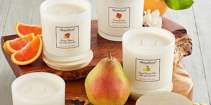 The collection includes five food-inspired scents: Cozy Vanilla Spice, Pumpkin Spice, Orange Blossom, Peach Gardenia and Royal Riviera Pear.