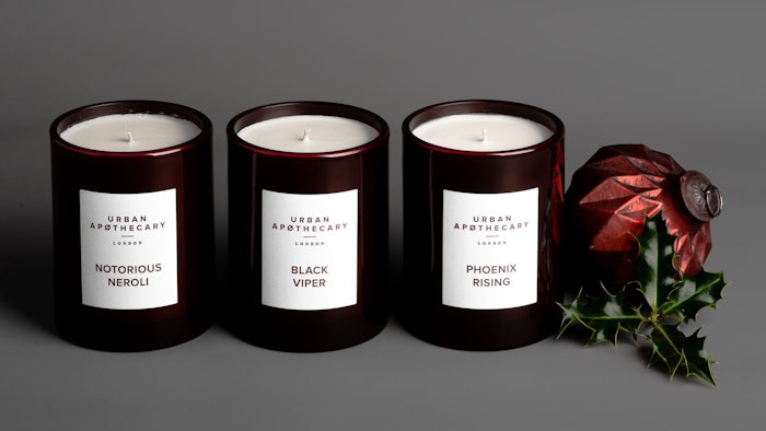 Urban Apothecary’s Ruby Red collection consists of three candles packaged in ruby-colored glass.