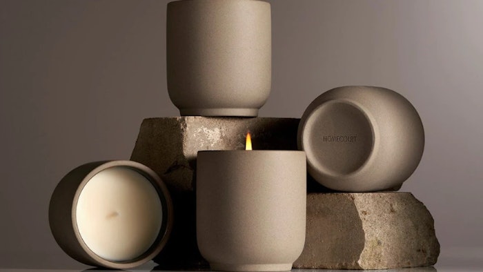 Each candle is hand-poured into custom kiln-dried clay vessels and burns for 60 hours.