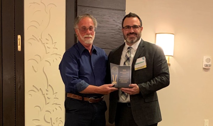 L to R: Mike Fasano received the SFC Golden Blotter Award by Campbell Soup Company's principal scientist of Flavor Technology, Paul Ricciardi.