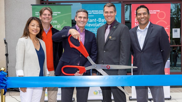 L to R: Sherry Sian Linert, VP, Firmenich West Coast Ventures; Karl Witton, Global VP of Nutrition; Chris Perkins, President and SVP, Taste & Beyond North America (with scissors); Trevor O-Neil, Mayor pro tem of Anaheim; Michael Moreno, Director of Operations.