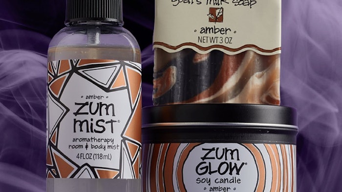 The collection includes an amber body mist, soap, body wash and candle.