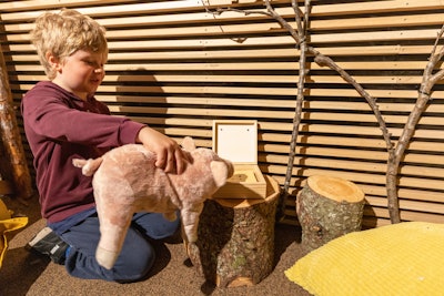 For the first—pig farm smell. The smell conveys the associations of pigs, pee, mud, and poop, purposefully stinky and placed on the floor of a mini pig farm in the exhibition.