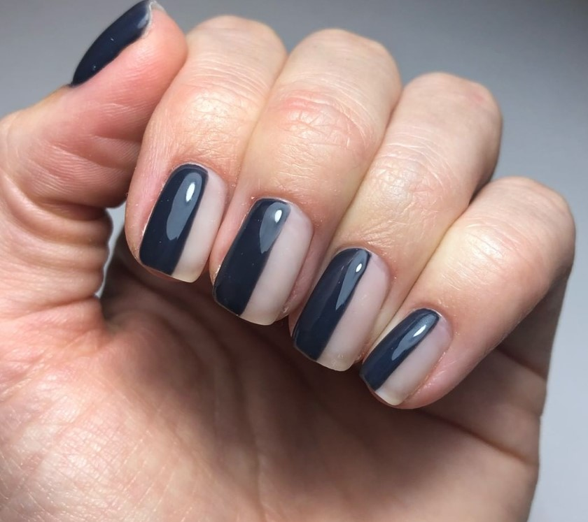 Nail art that is half glossy and half matte.