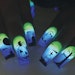 Glow in the dark Halloween nail art designed by Rebecca Ludwig