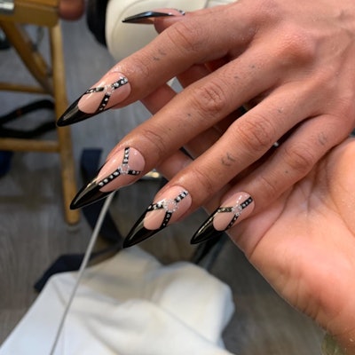 Anitta wears a bondage-inspired nail design by Master Weenay