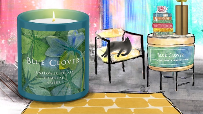 The Blue Clover bougie perfumée candle offers scent notes of sunflower petals, tuberose, amber, gardenia, tonka bean, jasmine and cashmere wood.