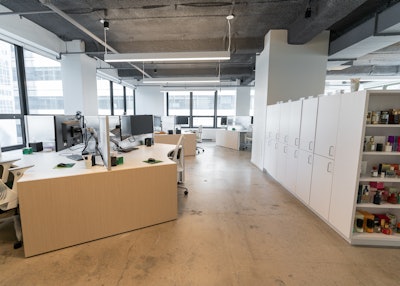 The renovations included open workstations designed with a modern flair and industrial accents to promote creative collaboration.