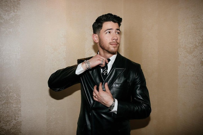 Celebrity Men’s Groomer Marissa Machado created Nick Jonas' hair look for the 2023 Met Gala using products from FEKKAI.