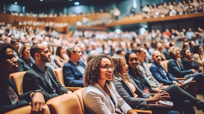 multi-ethnic people at educational conference presentation