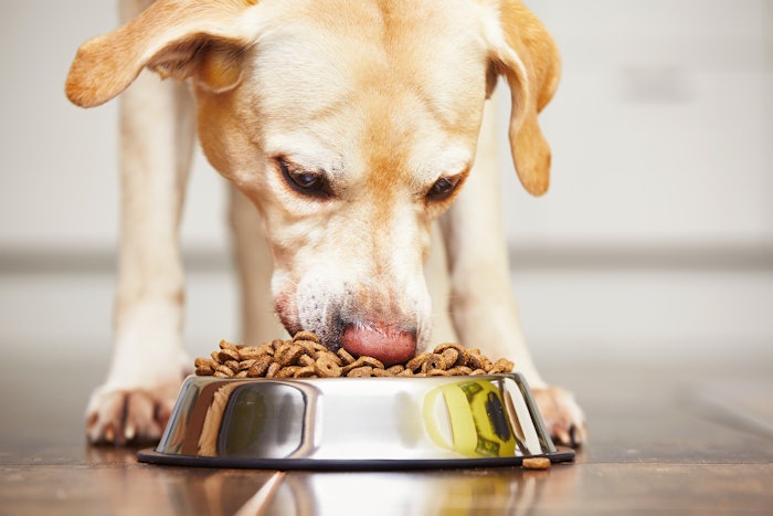 Pet food refers to a specialized diet created for domestic animals that meets all their nutritional requirements.