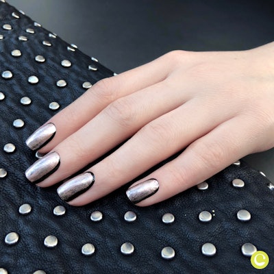 A reflective silver manicure