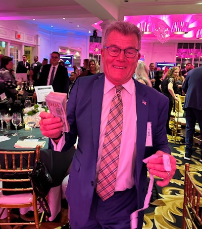 Fred Kritzer, sales consultant at Aromaholic LLC won the 50/50 raffle.