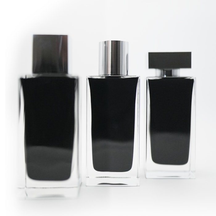 The spray application reportedly offers thorough coverage that accommodates the bottle's specific volume and glass density.