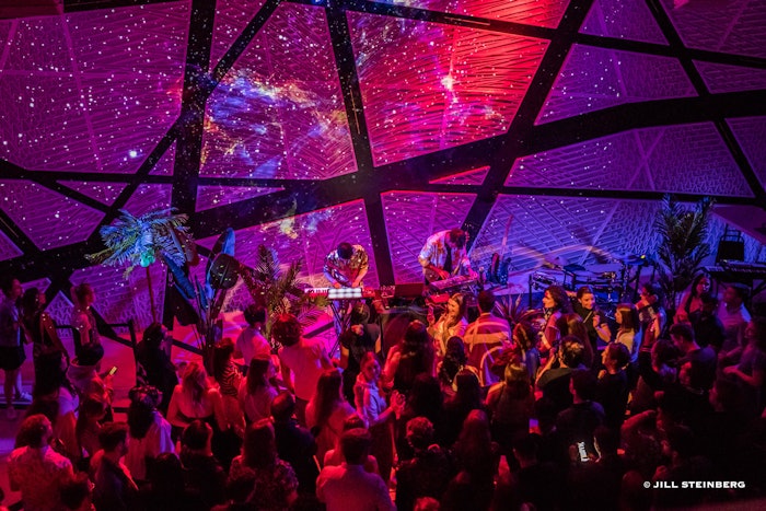 The show combines live electronic music, interactive visuals and original scents that engage the audience in a multi-sensory journey in three chapters.
