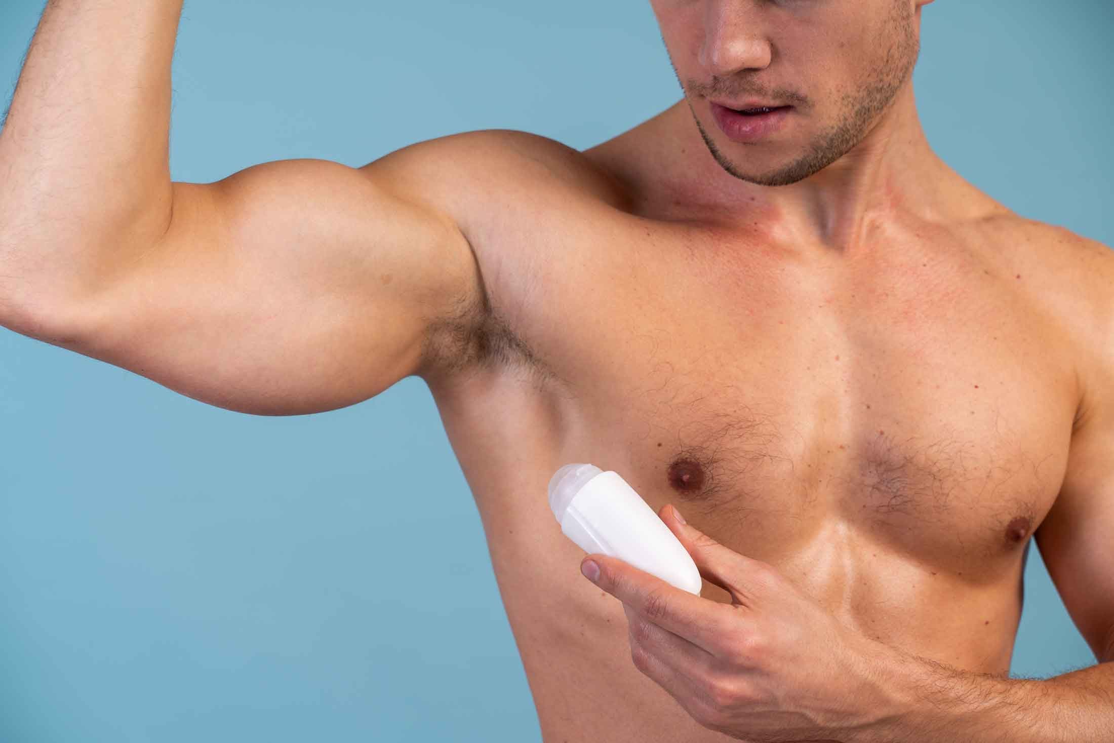 Man Using Clear Stick Deodorant Nouryon Formula Focus Adobe Stock 479578624