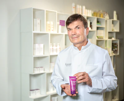 Luigi L. Polla, MD, pictured with the brand's Skin Repair Gel.