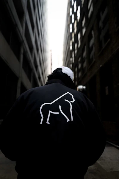 John Mosley wearing Popular Nobody merchandise.