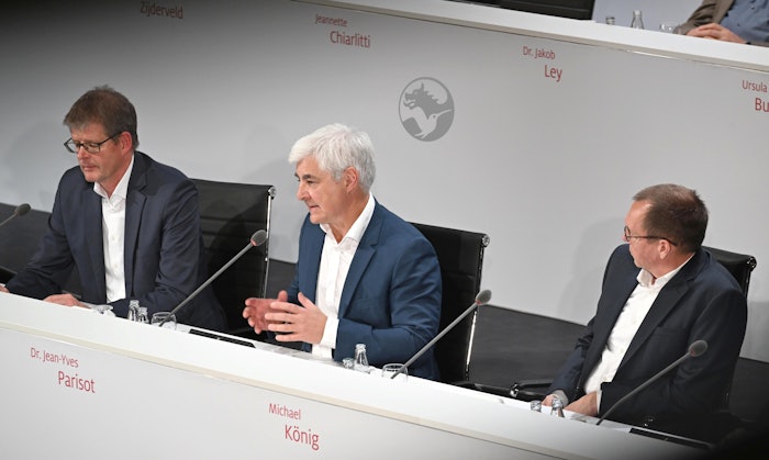 New Symrise CEO Jean-Yves Parisot, Ph.D., (center) at the Annual General Meeting with CFO Olaf Klinger (L) and Supvervisory Board Chair Michael Koenig (R).