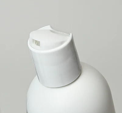 The disc-top closure features an integrated, concealed mechanism that requires more force to be applied upon initial opening, but thereafter operates as a standard disc top closure, per Aptar.