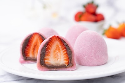 Some notable innovations include chimichurri-flavored popcorn, mango yogurt with black sea salt, dried pineapple glazed with chamoy, and chocolate-covered strawberry mochi gummies (pictured).