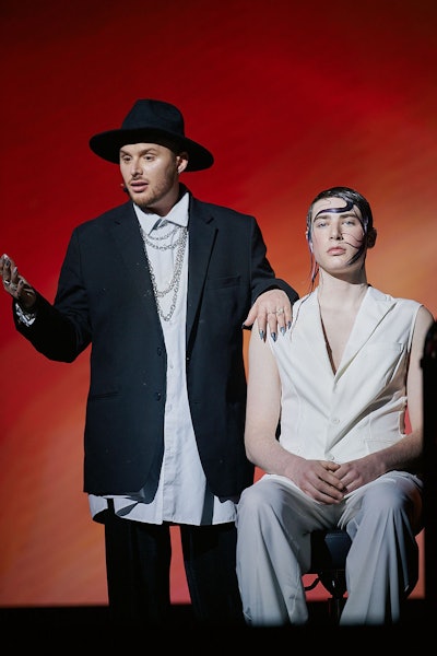 J Ladner educating on a main stage.