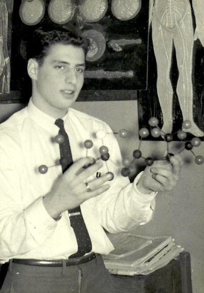Stephen Manheimer at the New York City Science Fair in 1957 presenting his storyboard and molecule model of linalool extracted from Rosewood Brazil oil.