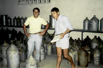 Stephen Manheimer and William Pecout, managing the operations of Bambao, on a 1967 trip to the Comoros Islands.