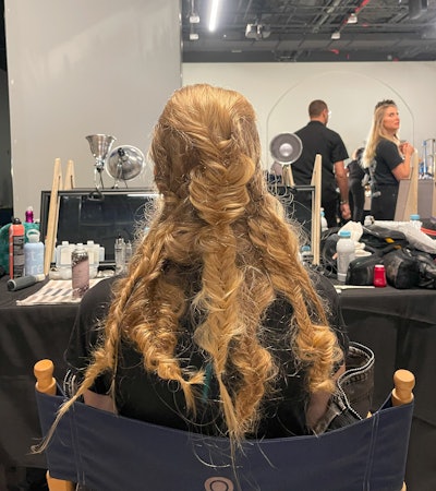 To create the 'urban Victorian chic styles' for the Who Decides War SS25 Show, Rutger used Uberliss Flexin Hairspray and Uberliss Dry Shampoo to give the hair just the right texture and hold.