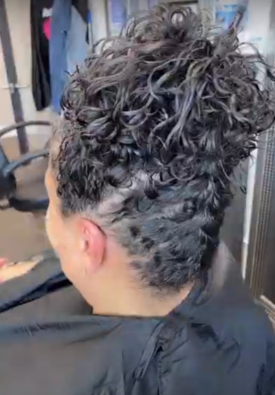 This stunning French Braid Pin-Up that enhances natural curls while keeping the look polished and elegant.