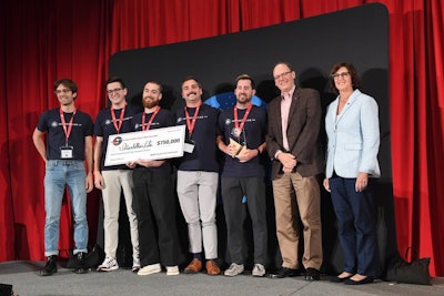 The Interstellar Lab team at the Deep Space Food Challenge Symposium at Ohio State University accepted the award from Michael Green (Deputy Associate Administrator, NASA STMD) and Robyn Gatens (Director of International Space Station, NASA HQ).
