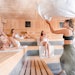 Traditional sauna ritual performed for group of females in spa center