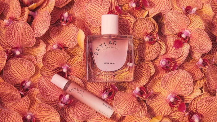Scent notes for Nude Skin include tiger orchid, warm vanilla, and golden amber.