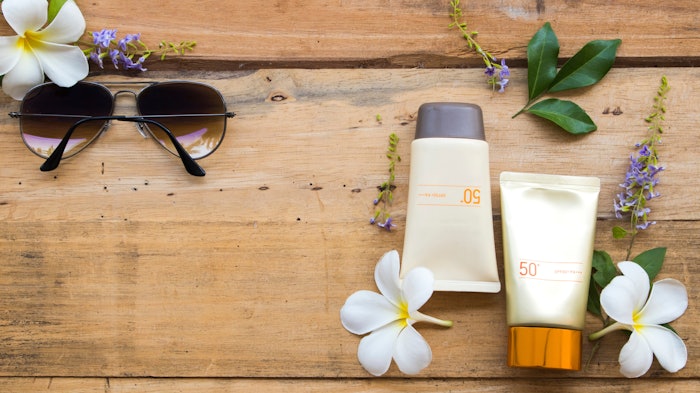 sustainable natural sun care concept wooden background