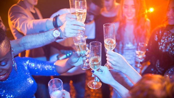 People With Cocktails Celebrating Adobe Stock 202996391