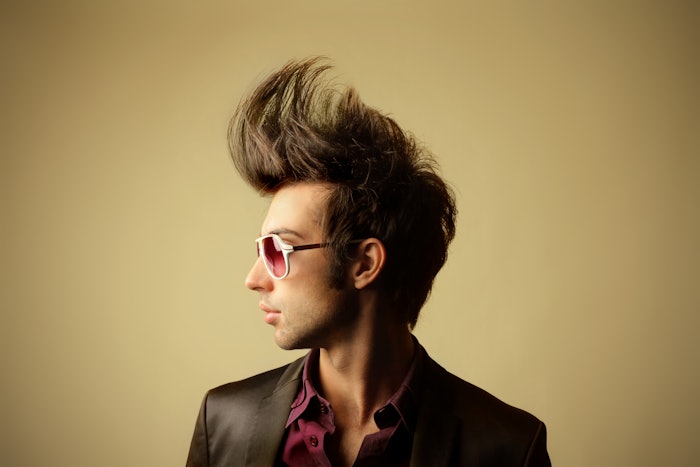 Man With Tall Wave Of Hair Accentuated Big Weird Hair Adobe Stock 17658171