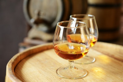 The tonka, woody notes of gamma heptalactone can be used in rum and brandy flavors.