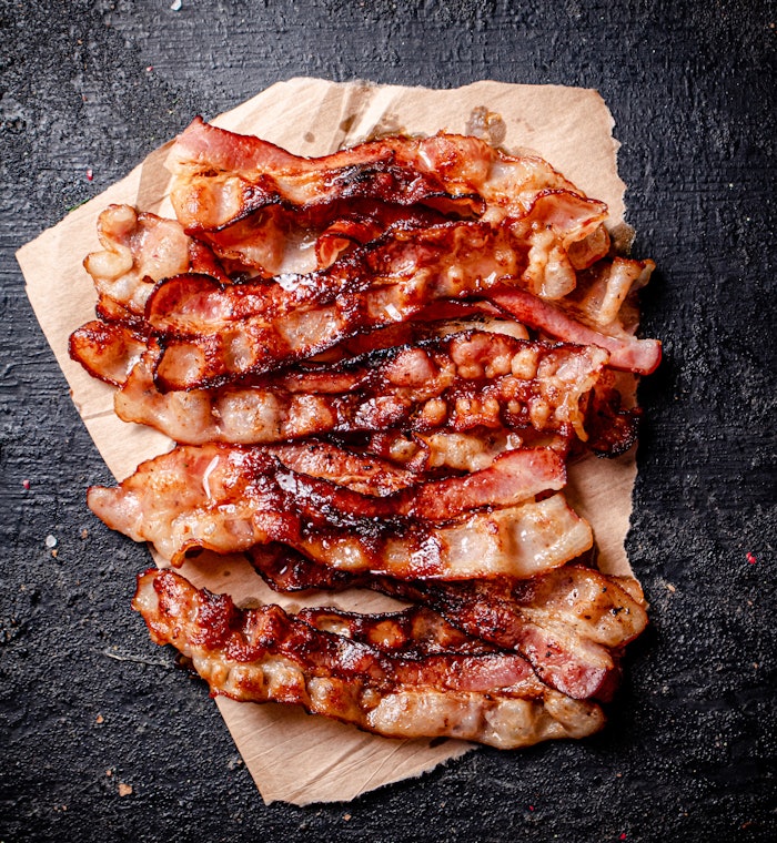 Piecesoffriedbacononpaper20240919002434utc 9000