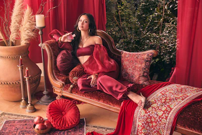 Brands like Skylar are capitalizing on the edible scent movement. Its recent launch, Pomegranate Princess, pairs juicy pomegranate and strawberry with a soft base of whipped frosting. Pictured is Skylar's chief creative officer, Leah Kateb, who gained fame on Love Island.