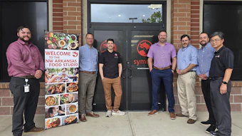 Members of Symrise's North American food and beverage team in front of the company's Northwest Arkansas Food Studio: Will Bryles - key account manager; Craig Biggers, VP of food BU; Vince Fazi, senior product development chef; Scott Haddox, senior account director; Ed Yancey, principle scientist; John Selser, key account mnanager; and Yongcheng Liu, principal scientist.