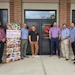 Members of Symrise's North American food and beverage team in front of the company's Northwest Arkansas Food Studio: Will Bryles - key account manager; Craig Biggers, VP of food BU; Vince Fazi, senior product development chef; Scott Haddox, senior account director; Ed Yancey, principle scientist; John Selser, key account mnanager; and Yongcheng Liu, principal scientist.
